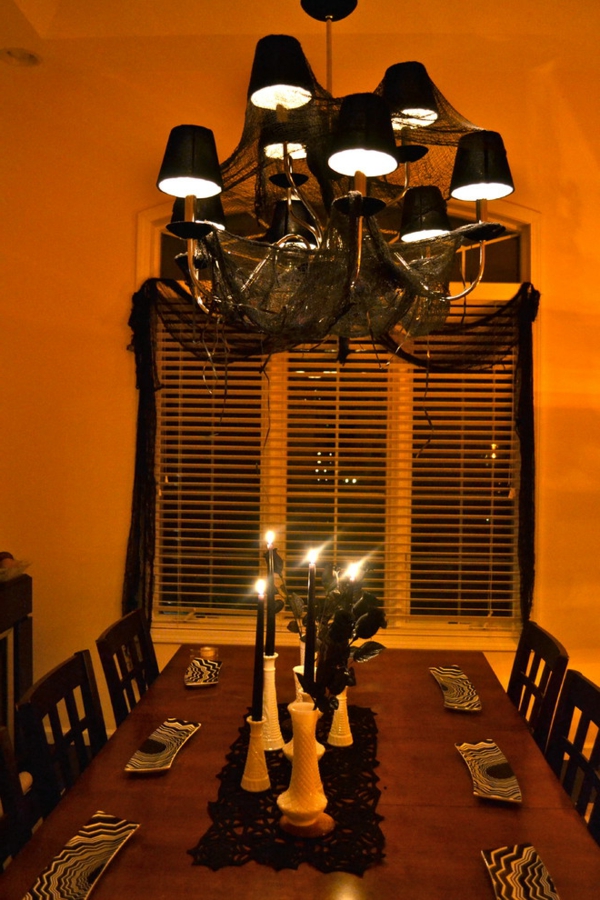 strašidelný Halloween dekorace nápady stolní svíčka svícen oranžová