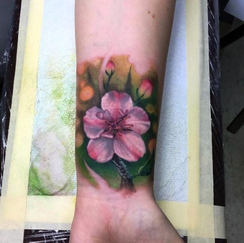 Håndleddet tatovering ideer kirsebær blomst lilla