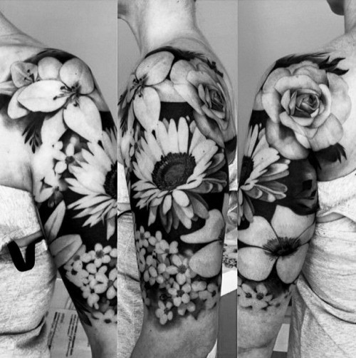 Negativní prostorové tetovací motivy různé květiny nadloktí a rameno