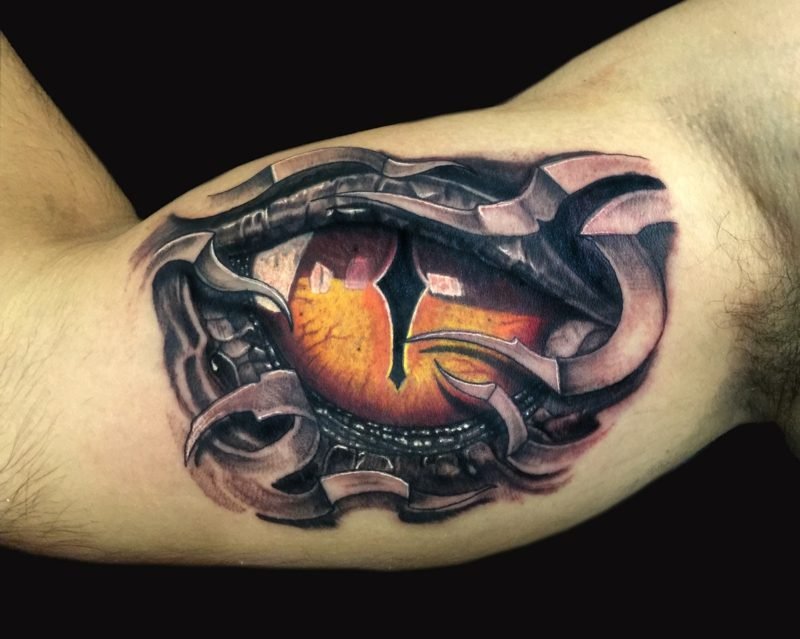 biceps tattoo dragon eye