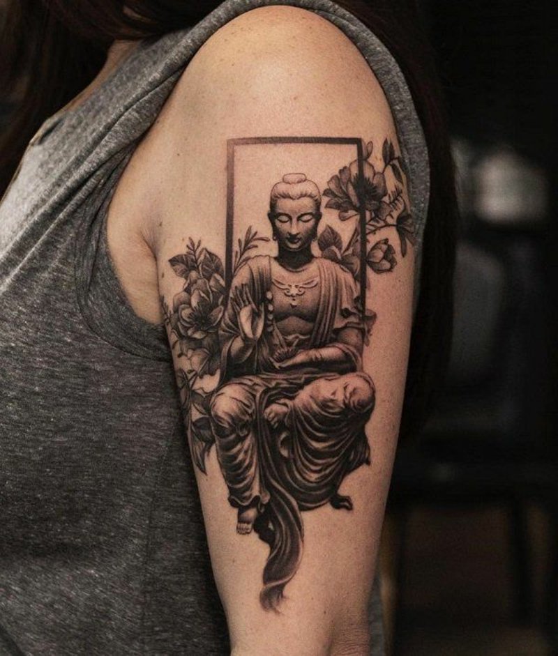 Tattoo skulder Buddha