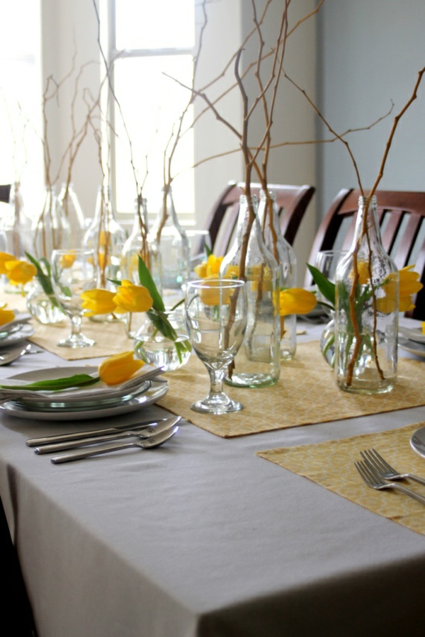 עיטור פרחי אביב צבעונים צהובים קישוט שולחן בשפע