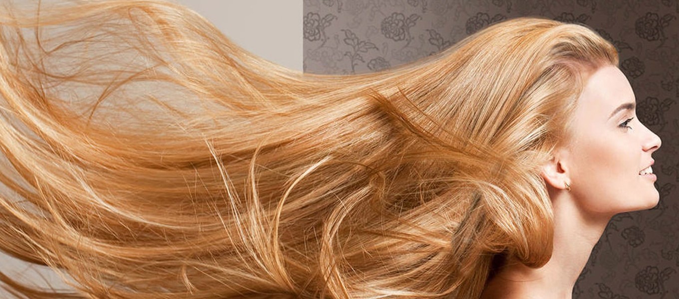 hårtransplantasjon hos kvinner langt rødt hår