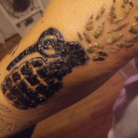 užkrėstos granatos tatuiruotė