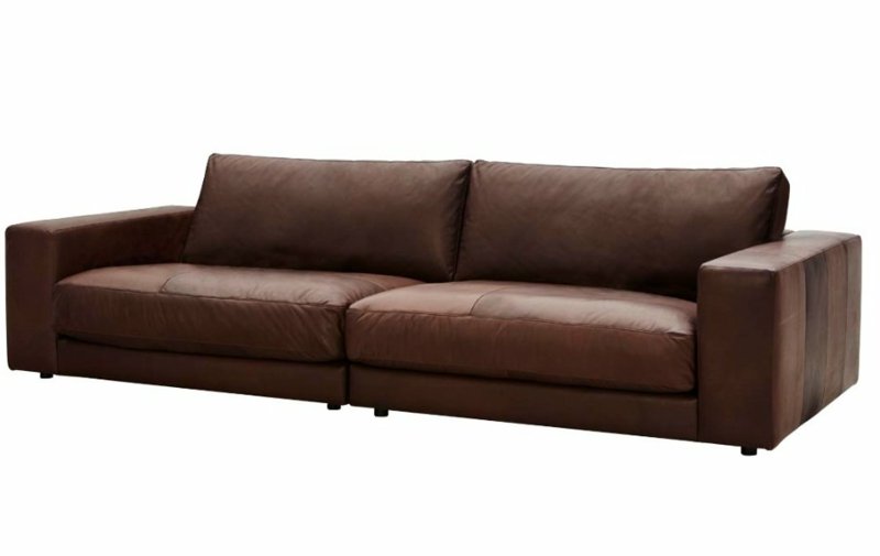 behagelig skinnbrun polstring i sofa