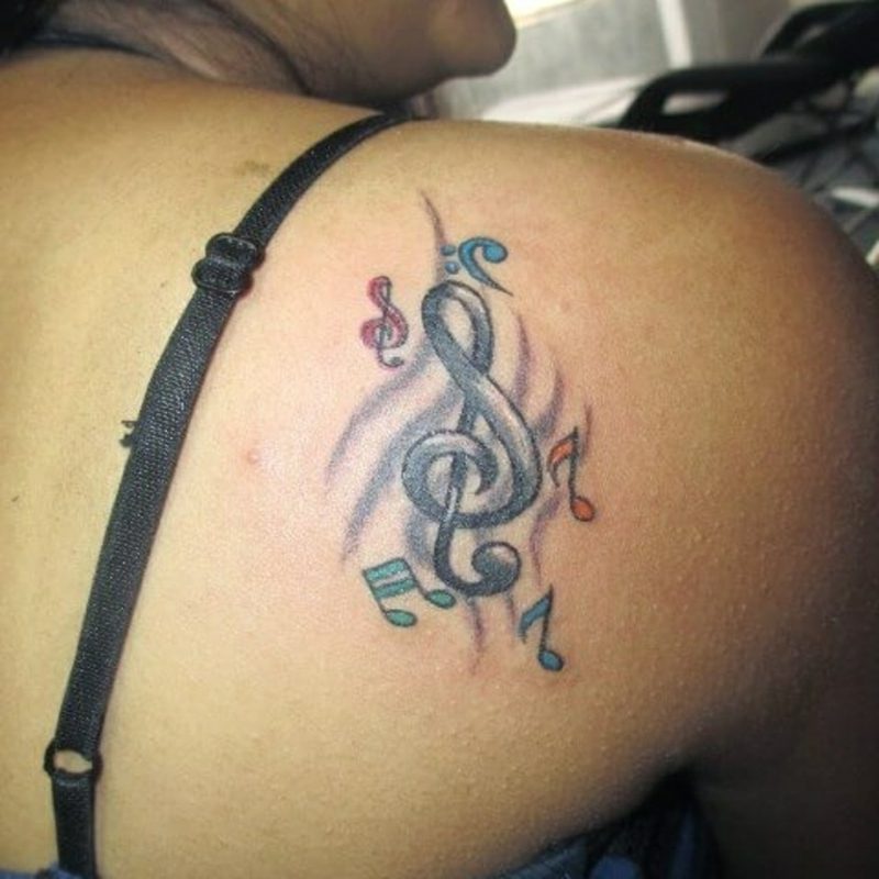 Clef Tattoo musikk symbol skulder tatovering
