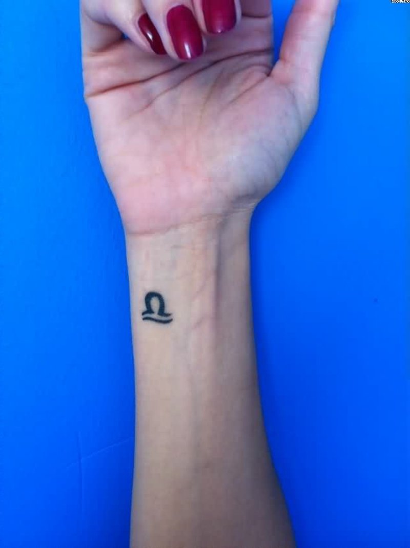 zodiac-tattoo-Girl-With-Small-Libra-Tattoo-On-Left-Wrist