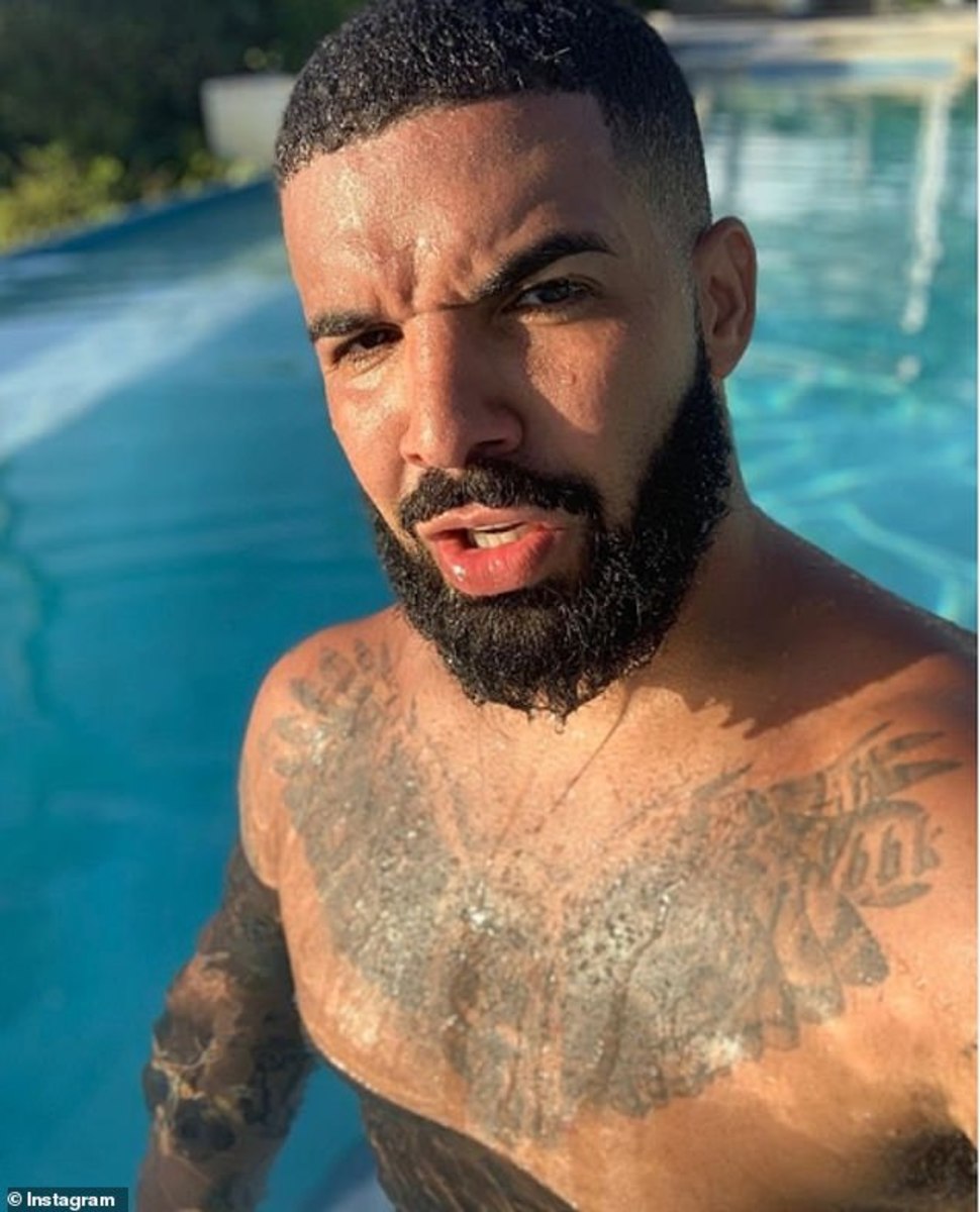 18693888-7483887-Inked_performer_Drake_is_known_for_getting_tattoos_all_over_his_-a-81_1568934780031