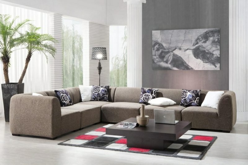Obývací pokoj šedá stěna design